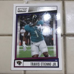 Score a football card Travis ETN jr